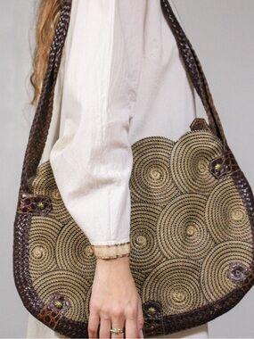 ERIC JAVITS Woven Geometric
Squishee Swirls + Woven Leather
Trim Shoulder Bag